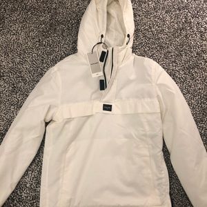 Water repellent Jack & Jones jacket in off-white.